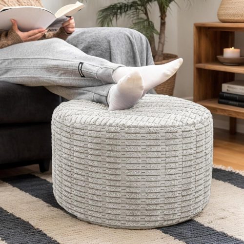 Round ottoman pouf foot stool, all-one-foam construction, removable cover, for living room bedroom dorm.